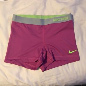 Pink and green Nike Pro Spandex